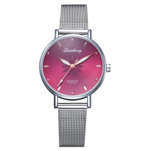 Women's Stylish Elegant Watch With Braided Steel Bracelet With Shiny Background Unique Design Perfect Gif