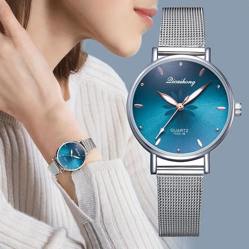 Women's Stylish Elegant Watch With Braided Steel Bracelet With Shiny Background Unique Design Perfect Gif