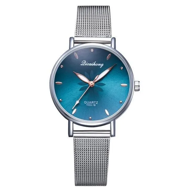 Women's Stylish Elegant Watch With Braided Steel Bracelet With Shiny Background Unique Design Perfect Gif